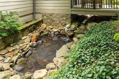 This one-of-a-kind, beautifully maintained four-bedroom on Lake Toxaway Country Club in North Carolina - for sale on GolfHomes.com, golf home, golf lot