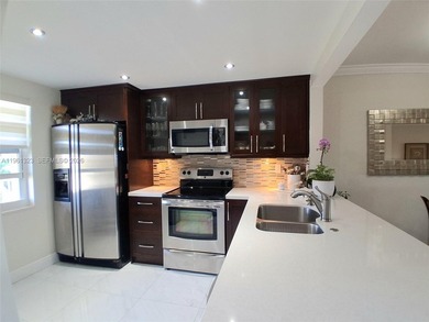 FULLY REMODELED LAKE FRONT-CONDO located in the heart of on Sunrise Lakes Phase IV Golf Course in Florida - for sale on GolfHomes.com, golf home, golf lot