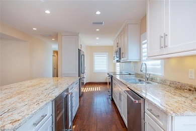 Discover tranquility in this exquisite Avignon model, a on Club at Pelican Bay Golf Course in Florida - for sale on GolfHomes.com, golf home, golf lot