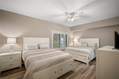 Experience the Ultimate in Tropical Living! Enjoy serene lake on Club at Pelican Bay Golf Course in Florida - for sale on GolfHomes.com, golf home, golf lot