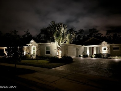 Enjoy peaceful water and wooded views in this beautifully on Venetian Bay Golf Course in Florida - for sale on GolfHomes.com, golf home, golf lot