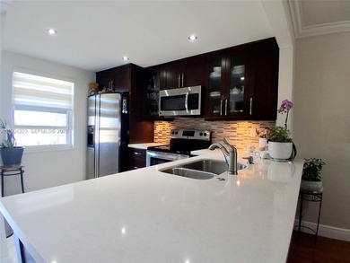 FULLY REMODELED LAKE FRONT-CONDO located in the heart of on Sunrise Lakes Phase IV Golf Course in Florida - for sale on GolfHomes.com, golf home, golf lot