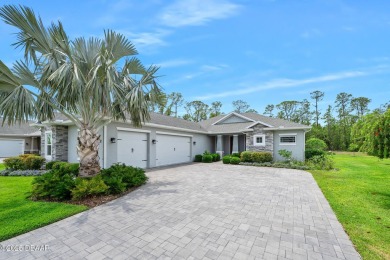 Enjoy peaceful water and wooded views in this beautifully on Venetian Bay Golf Course in Florida - for sale on GolfHomes.com, golf home, golf lot