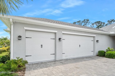 Enjoy peaceful water and wooded views in this beautifully on Venetian Bay Golf Course in Florida - for sale on GolfHomes.com, golf home, golf lot