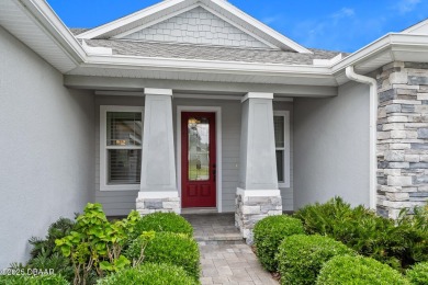 Enjoy peaceful water and wooded views in this beautifully on Venetian Bay Golf Course in Florida - for sale on GolfHomes.com, golf home, golf lot