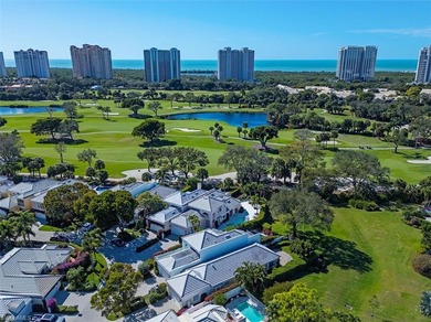 Discover tranquility in this exquisite Avignon model, a on Club at Pelican Bay Golf Course in Florida - for sale on GolfHomes.com, golf home, golf lot