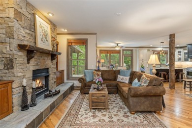 This one-of-a-kind, beautifully maintained four-bedroom on Lake Toxaway Country Club in North Carolina - for sale on GolfHomes.com, golf home, golf lot