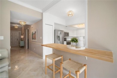 Experience the Ultimate in Tropical Living! Enjoy serene lake on Club at Pelican Bay Golf Course in Florida - for sale on GolfHomes.com, golf home, golf lot