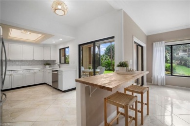 Experience the Ultimate in Tropical Living! Enjoy serene lake on Club at Pelican Bay Golf Course in Florida - for sale on GolfHomes.com, golf home, golf lot