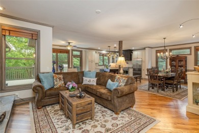 This one-of-a-kind, beautifully maintained four-bedroom on Lake Toxaway Country Club in North Carolina - for sale on GolfHomes.com, golf home, golf lot