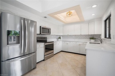 Experience the Ultimate in Tropical Living! Enjoy serene lake on Club at Pelican Bay Golf Course in Florida - for sale on GolfHomes.com, golf home, golf lot