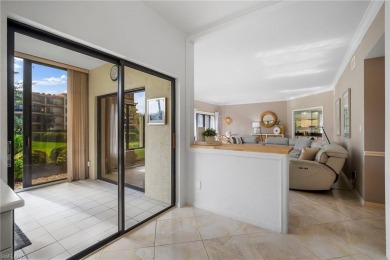 Experience the Ultimate in Tropical Living! Enjoy serene lake on Club at Pelican Bay Golf Course in Florida - for sale on GolfHomes.com, golf home, golf lot