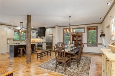 This one-of-a-kind, beautifully maintained four-bedroom on Lake Toxaway Country Club in North Carolina - for sale on GolfHomes.com, golf home, golf lot