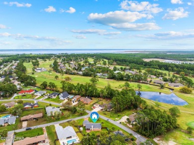 Charming Coastal Retreat - Fully Updated & Prime LocationWelcome on Holiday Golf Club in Florida - for sale on GolfHomes.com, golf home, golf lot