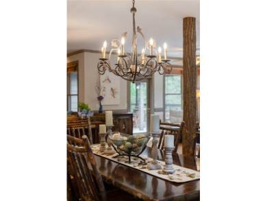 This one-of-a-kind, beautifully maintained four-bedroom on Lake Toxaway Country Club in North Carolina - for sale on GolfHomes.com, golf home, golf lot