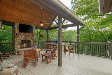 This one-of-a-kind, beautifully maintained four-bedroom on Lake Toxaway Country Club in North Carolina - for sale on GolfHomes.com, golf home, golf lot