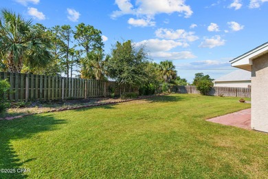 This is a fully updated coastal home on a corner lot in Panama on Holiday Golf Club in Florida - for sale on GolfHomes.com, golf home, golf lot