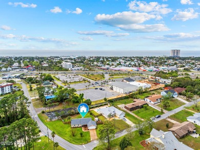 This is a fully updated coastal home on a corner lot in Panama on Holiday Golf Club in Florida - for sale on GolfHomes.com, golf home, golf lot