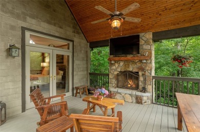 This one-of-a-kind, beautifully maintained four-bedroom on Lake Toxaway Country Club in North Carolina - for sale on GolfHomes.com, golf home, golf lot