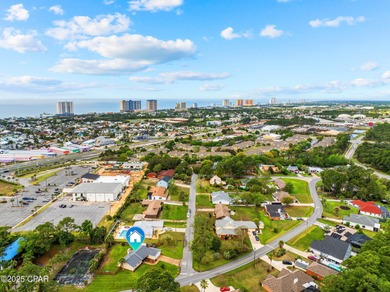This is a fully updated coastal home on a corner lot in Panama on Holiday Golf Club in Florida - for sale on GolfHomes.com, golf home, golf lot