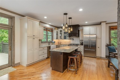 This one-of-a-kind, beautifully maintained four-bedroom on Lake Toxaway Country Club in North Carolina - for sale on GolfHomes.com, golf home, golf lot