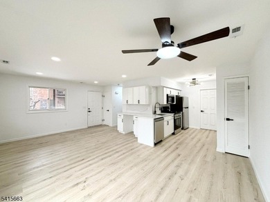 Beautifully detailed and renovated FIRST FLOOR, END UNIT on Minerals Golf Club in New Jersey - for sale on GolfHomes.com, golf home, golf lot