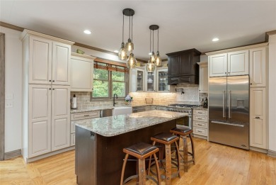 This one-of-a-kind, beautifully maintained four-bedroom on Lake Toxaway Country Club in North Carolina - for sale on GolfHomes.com, golf home, golf lot