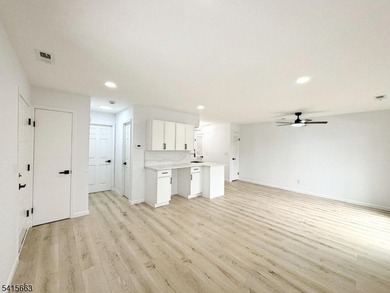 Beautifully detailed and renovated FIRST FLOOR, END UNIT on Minerals Golf Club in New Jersey - for sale on GolfHomes.com, golf home, golf lot