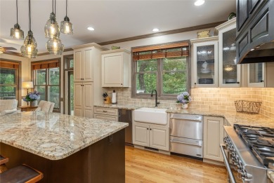 This one-of-a-kind, beautifully maintained four-bedroom on Lake Toxaway Country Club in North Carolina - for sale on GolfHomes.com, golf home, golf lot