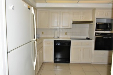 Welcome to this Beautiful 1st floor condo!  Perfectly located on On Top Of The World Golf Course in Florida - for sale on GolfHomes.com, golf home, golf lot