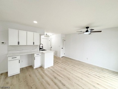 Beautifully detailed and renovated FIRST FLOOR, END UNIT on Minerals Golf Club in New Jersey - for sale on GolfHomes.com, golf home, golf lot