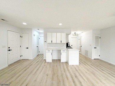 Beautifully detailed and renovated FIRST FLOOR, END UNIT on Minerals Golf Club in New Jersey - for sale on GolfHomes.com, golf home, golf lot