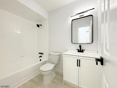 Beautifully detailed and renovated FIRST FLOOR, END UNIT on Minerals Golf Club in New Jersey - for sale on GolfHomes.com, golf home, golf lot