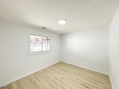 Beautifully detailed and renovated FIRST FLOOR, END UNIT on Minerals Golf Club in New Jersey - for sale on GolfHomes.com, golf home, golf lot