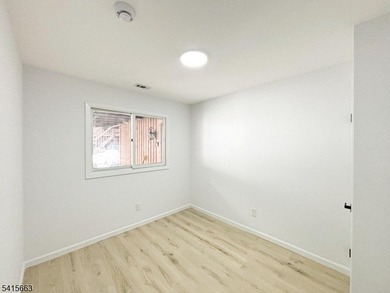 Beautifully detailed and renovated FIRST FLOOR, END UNIT on Minerals Golf Club in New Jersey - for sale on GolfHomes.com, golf home, golf lot