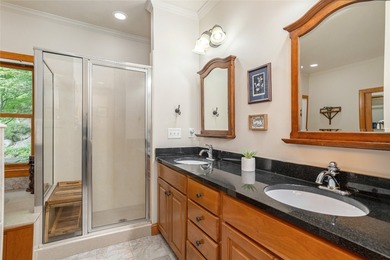 This one-of-a-kind, beautifully maintained four-bedroom on Lake Toxaway Country Club in North Carolina - for sale on GolfHomes.com, golf home, golf lot