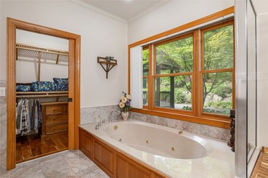 This one-of-a-kind, beautifully maintained four-bedroom on Lake Toxaway Country Club in North Carolina - for sale on GolfHomes.com, golf home, golf lot