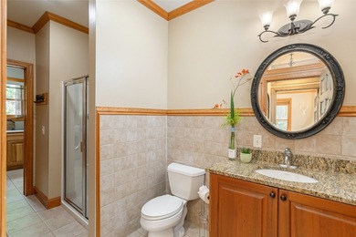 This one-of-a-kind, beautifully maintained four-bedroom on Lake Toxaway Country Club in North Carolina - for sale on GolfHomes.com, golf home, golf lot