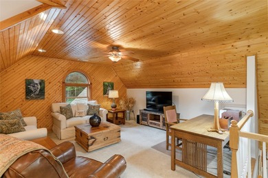 This one-of-a-kind, beautifully maintained four-bedroom on Lake Toxaway Country Club in North Carolina - for sale on GolfHomes.com, golf home, golf lot
