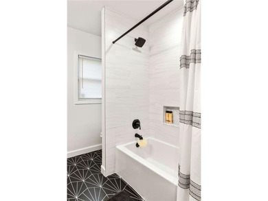 Fully renovated 3BR/2BA bungalow in sought-after East Lake on East Lake Golf Club in Georgia - for sale on GolfHomes.com, golf home, golf lot