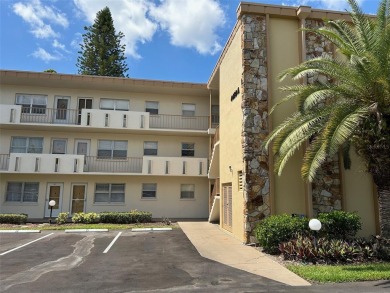 Enjoy Florida living in this delightful top floor (3rd), 1 on Pinebrook/Ironwood Golf Course in Florida - for sale on GolfHomes.com, golf home, golf lot