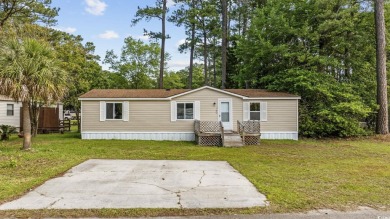 Discover your ideal beachside escape in the desirable Windjammer on Indian Wells Golf Course in South Carolina - for sale on GolfHomes.com, golf home, golf lot