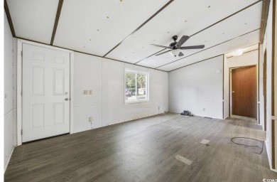 Discover your ideal beachside escape in the desirable Windjammer on Indian Wells Golf Course in South Carolina - for sale on GolfHomes.com, golf home, golf lot