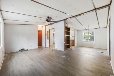 Discover your ideal beachside escape in the desirable Windjammer on Indian Wells Golf Course in South Carolina - for sale on GolfHomes.com, golf home, golf lot