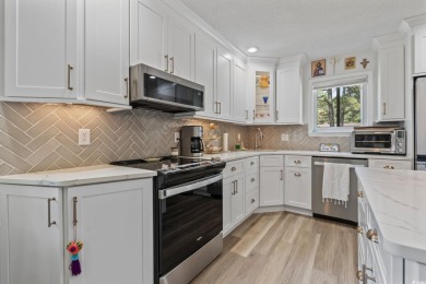 Welcome home to this beautifully renovated cottage style patio on Heron Point Golf Club in South Carolina - for sale on GolfHomes.com, golf home, golf lot