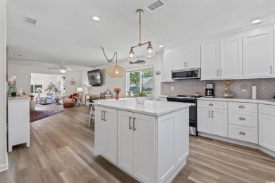 Welcome home to this beautifully renovated cottage style patio on Heron Point Golf Club in South Carolina - for sale on GolfHomes.com, golf home, golf lot