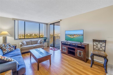 Move-in ready and fully furnished, this spacious 2-bed, 2-bath on Isla Del Sol Yacht and Country Club in Florida - for sale on GolfHomes.com, golf home, golf lot