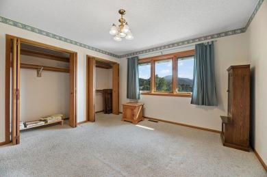 Listed by Emma Miller, Re/Max In The Hills, .  Townhome located on Spearfish Canyon Country Club in South Dakota - for sale on GolfHomes.com, golf home, golf lot