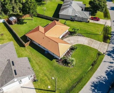 Welcome to this beautifully updated, move-in-ready home offering on The Grand Club - Pine Lakes Course in Florida - for sale on GolfHomes.com, golf home, golf lot