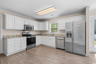 Welcome to this move-in ready, 4 bedroom, 3 bathroom home tucked on Shaftesbury Glen Golf and Fish Club in South Carolina - for sale on GolfHomes.com, golf home, golf lot